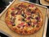 Prosciutto, Caramelized Onion, Mozzarella, Parmesan (White Pizza)