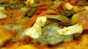 Three cheeses vegetarian pizza